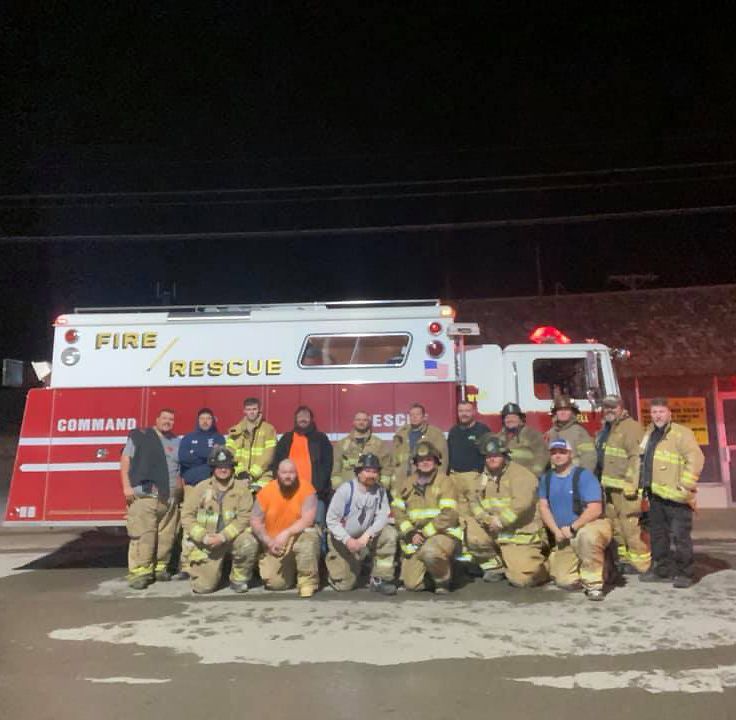 Stilwell Oklahoma firefighters posing in front of fire rescue truck