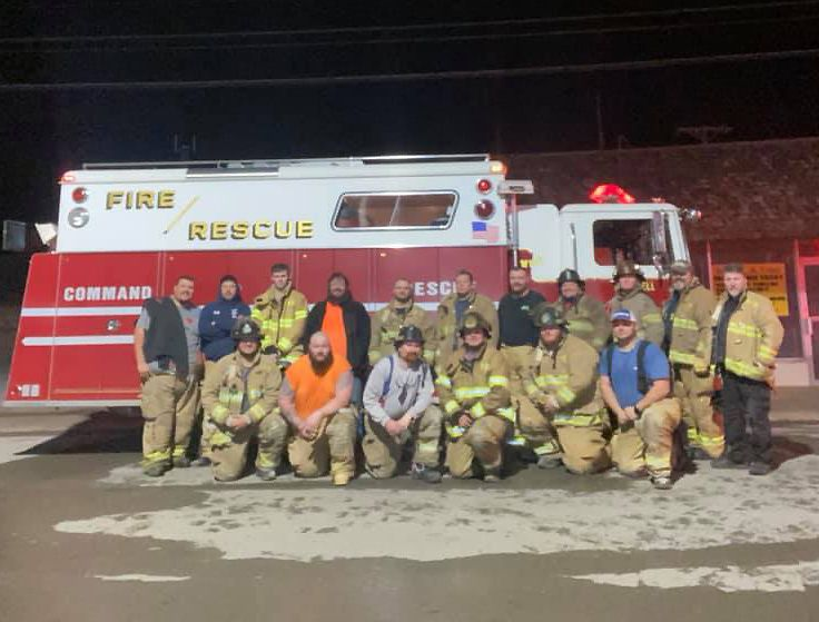 Stilwell Oklahoma firefighters posing in front of fire rescue truck