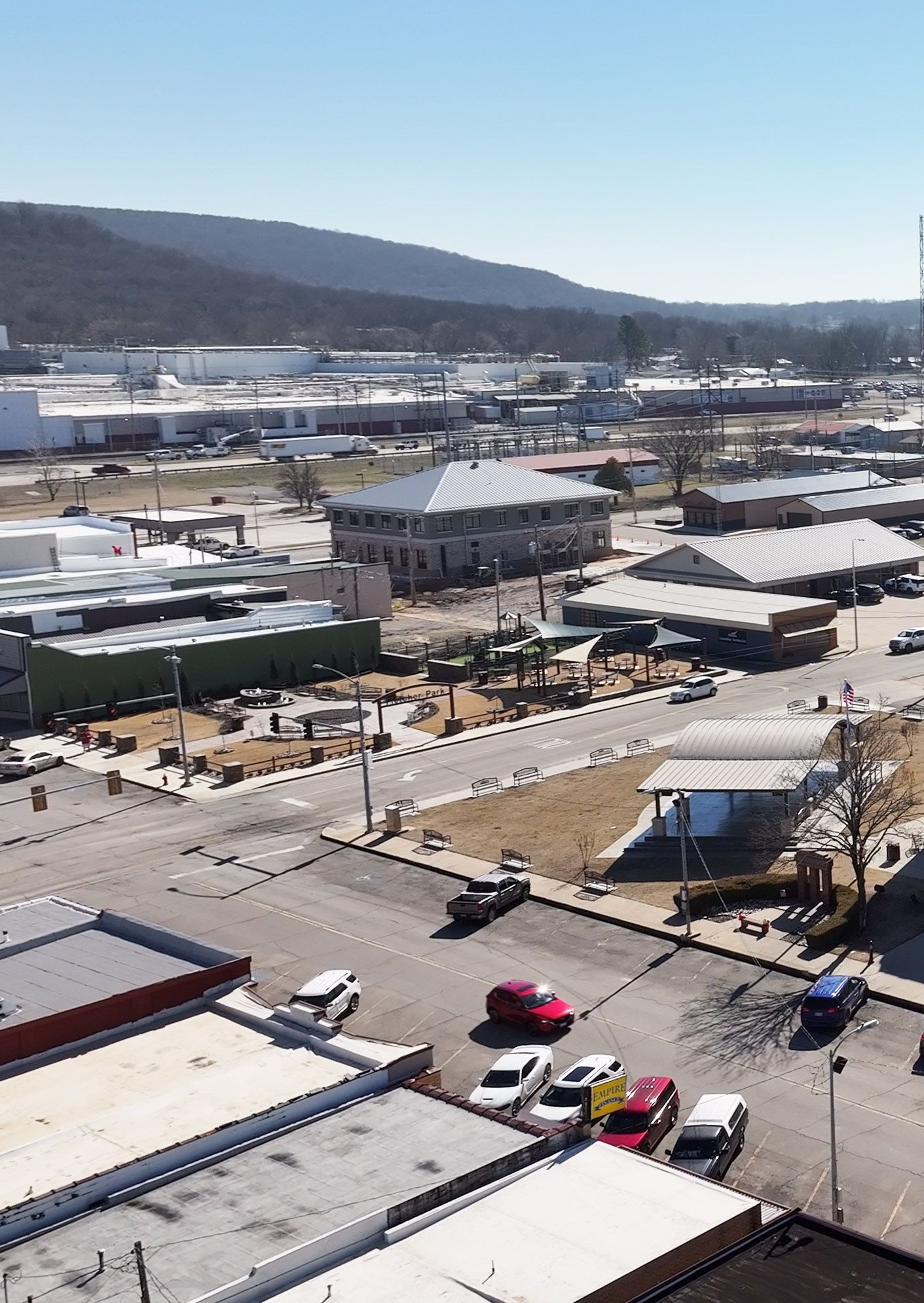 View of Schwan's Food Company factory, city hall, Fletcher Park, and Kiwanis bandstand in downtown Stilwell, Oklahoma