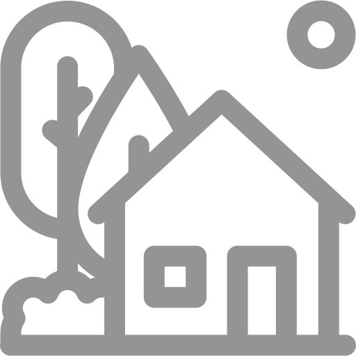 a house with a tree in front of it and a sun in the background .