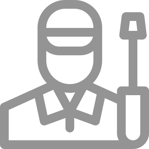 a man is holding a screwdriver in his hand .