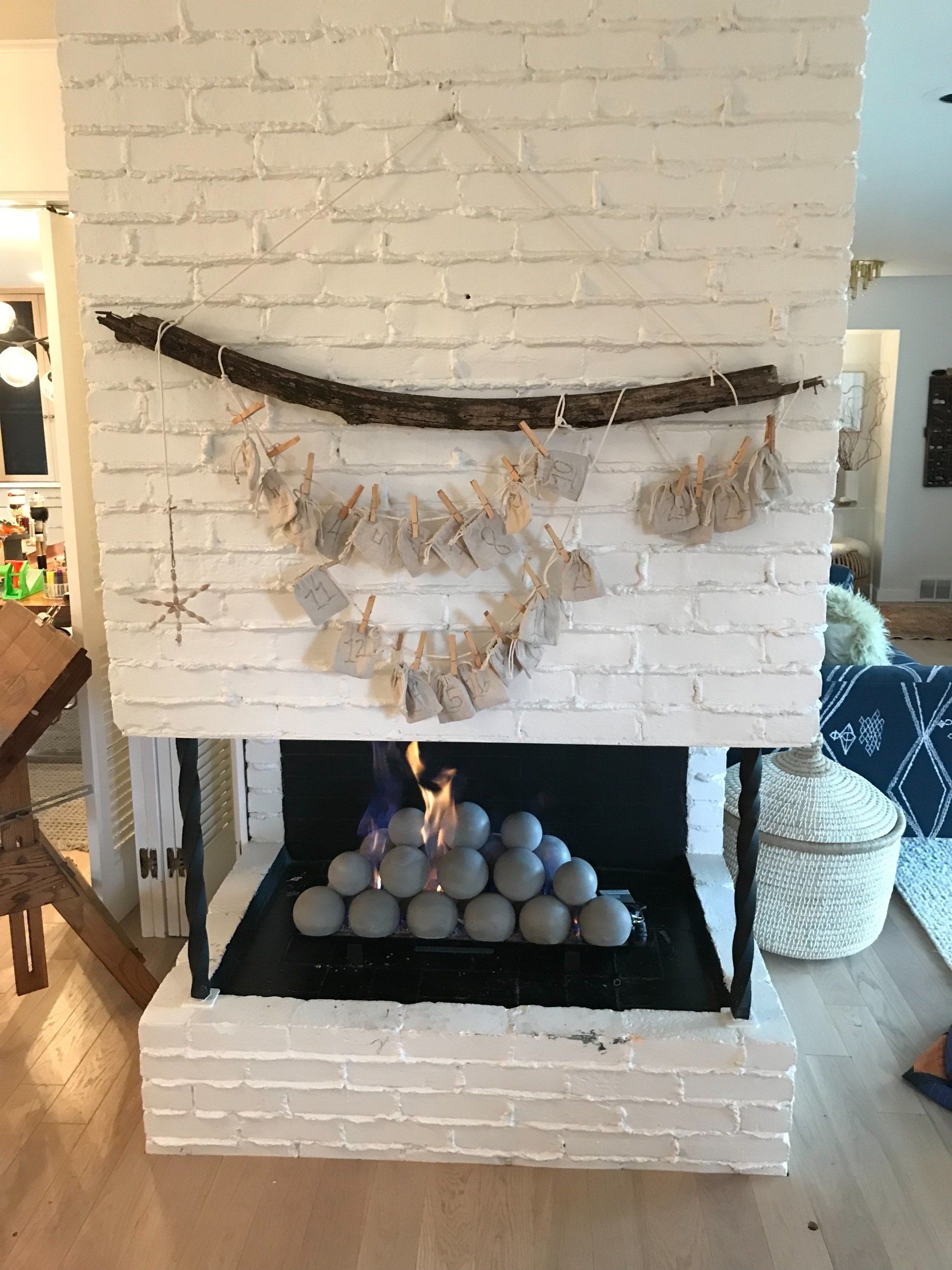 There is a fireplace in the middle of the room.