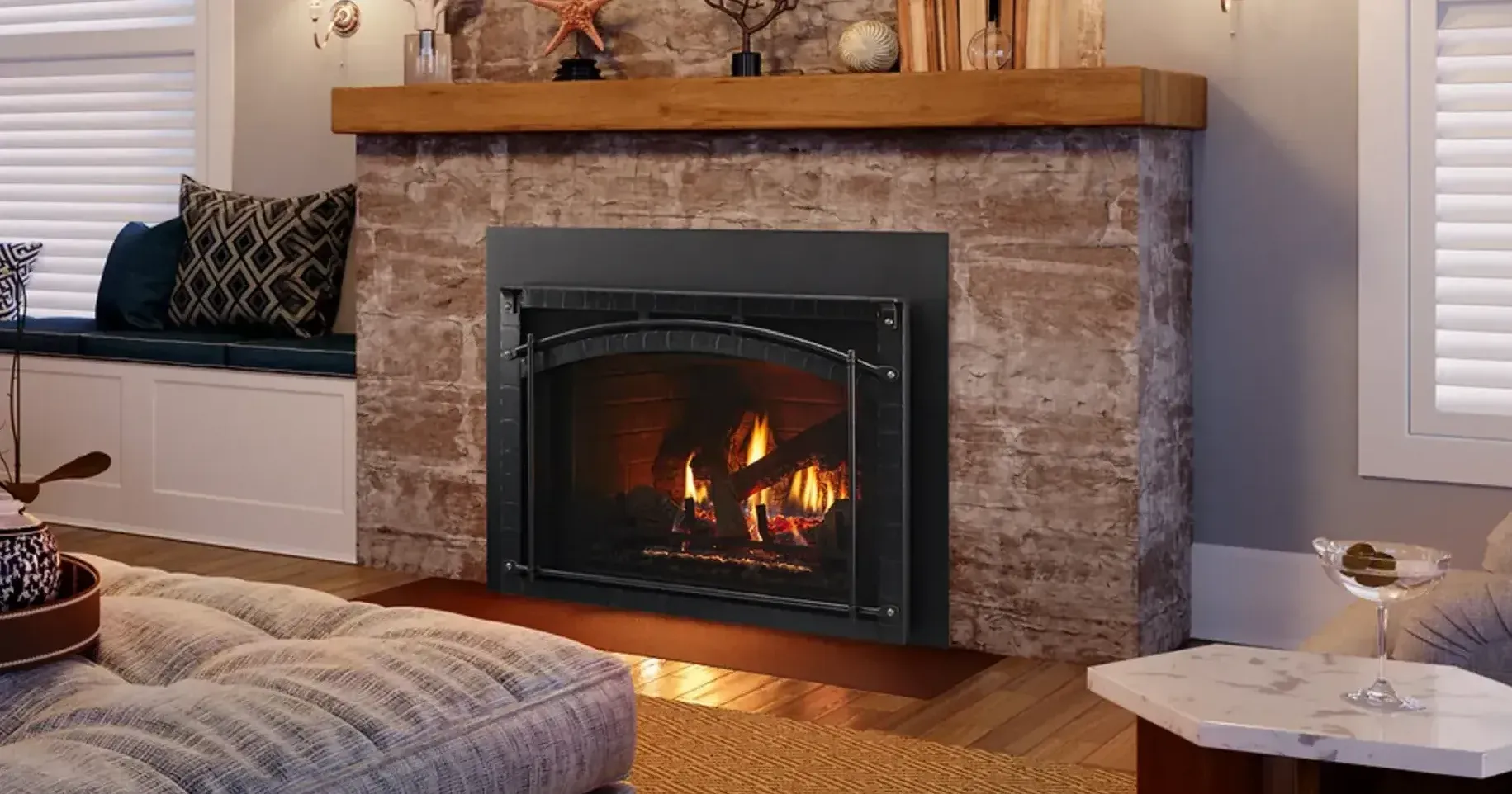 A living room with a fireplace and a couch.
