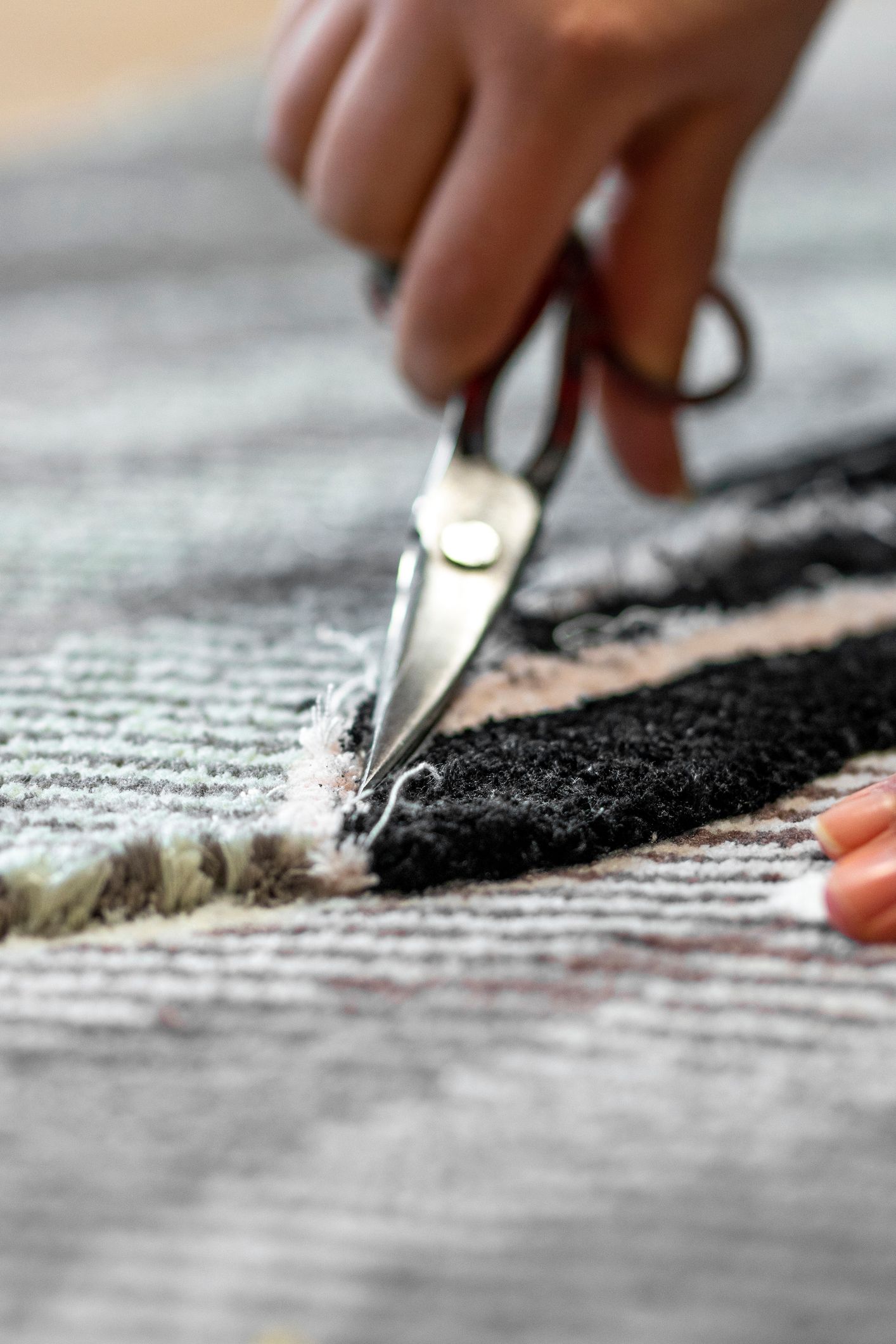 A brick wall with a tree in the background