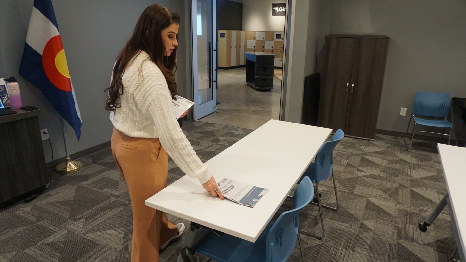 Therapist supports older adult during trauma-informed mental health session with care and empathy