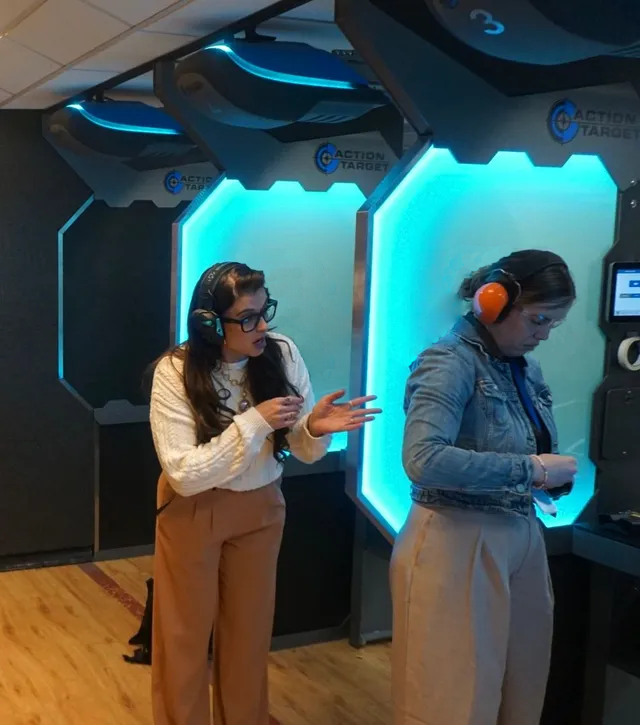 Therapist and client in trauma-informed session discussing care within a clinical setting