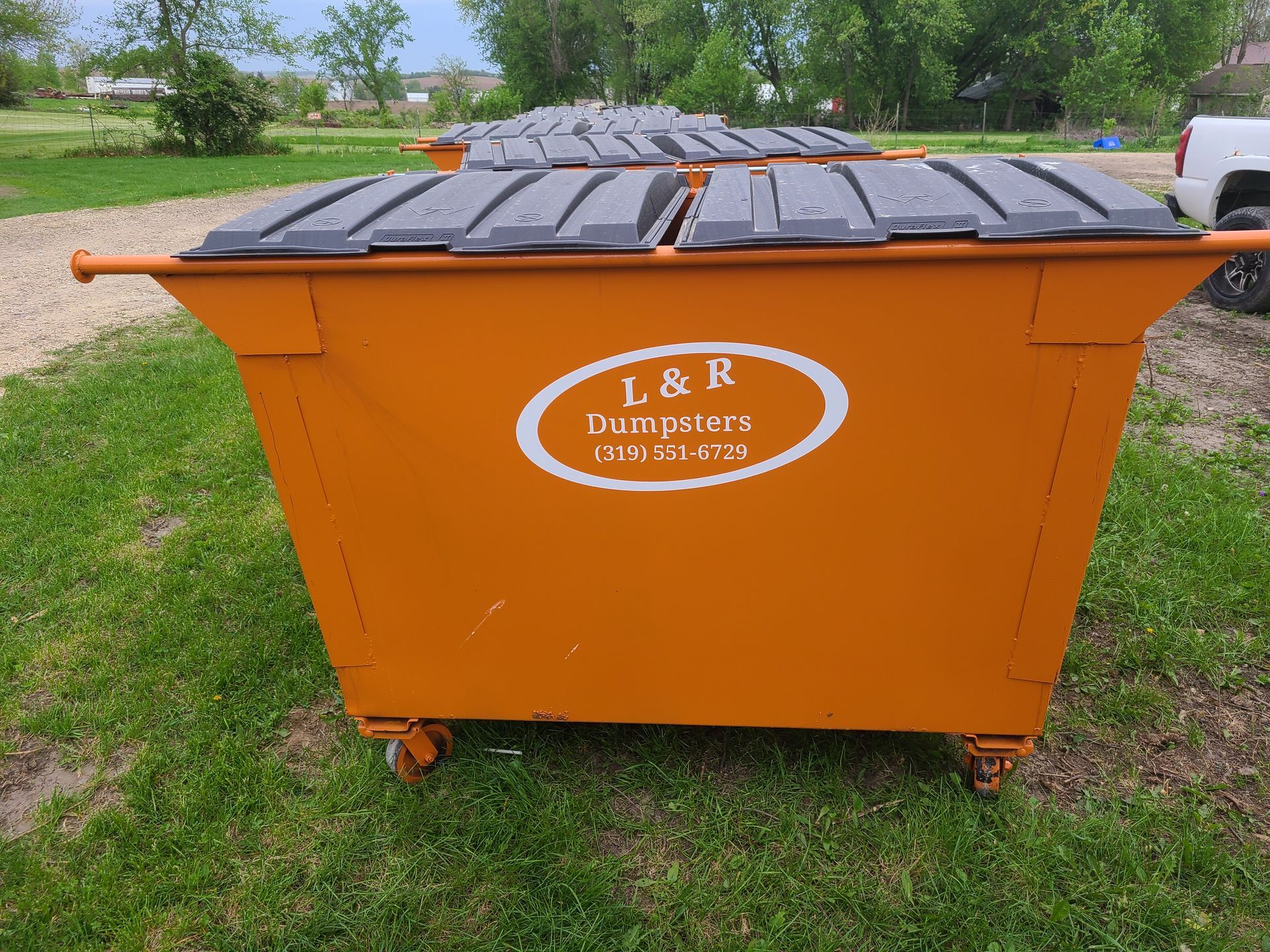 Outdoor Yellow Dumpster — Prairieburg, IA — L & R Dumpsters