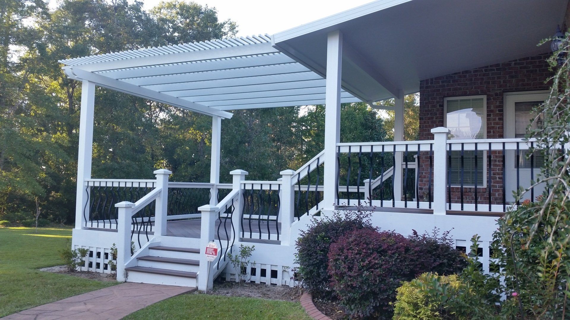 Pergola installation over a deck