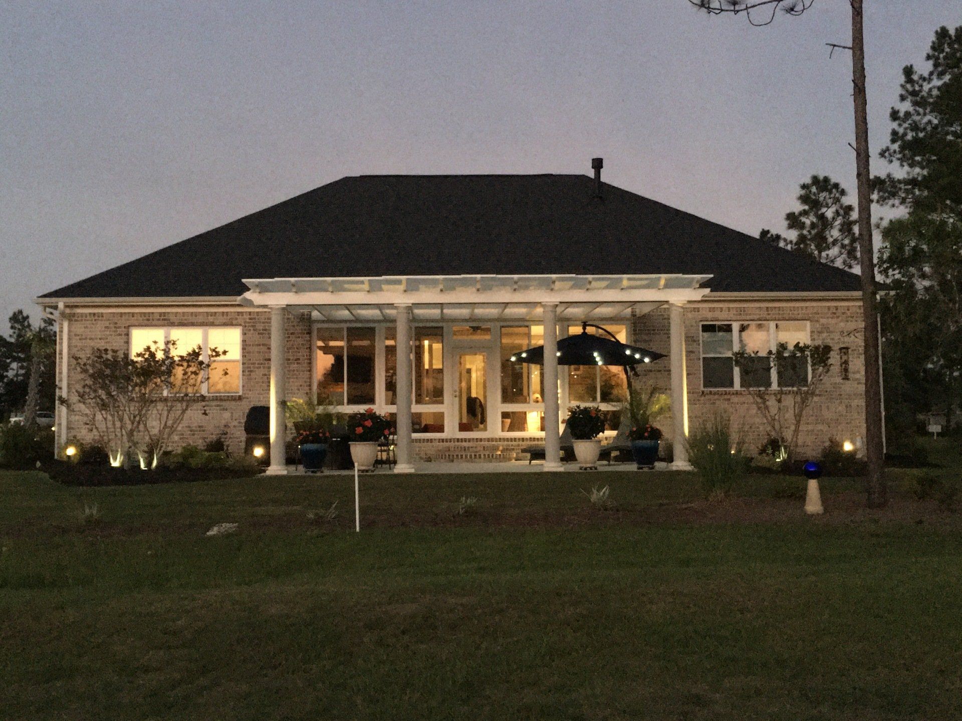 Pergola lit up by lights