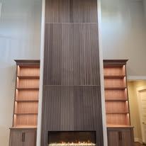 There is a fireplace in the middle of the room.