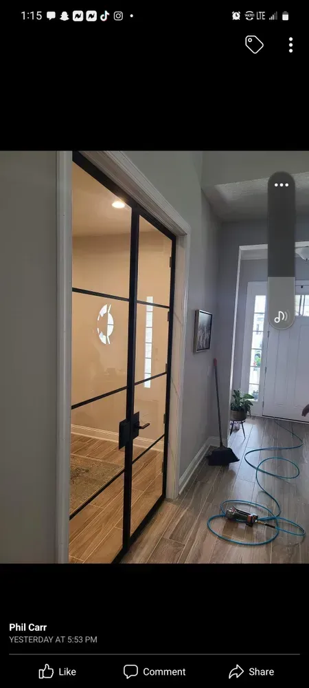 A picture of a sliding glass door in a house.
