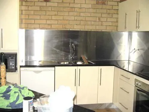 Steel Kitchen Counter with Steel Splashbacks | Hillcrest, Qld | Concept Metal Products