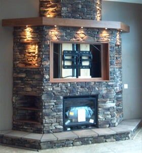 Ornate Stone Fireplace with Shelves