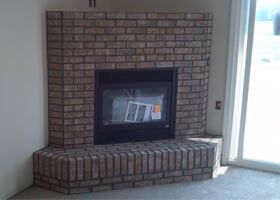 Stone Fireplace with Wooden Mantelpiece