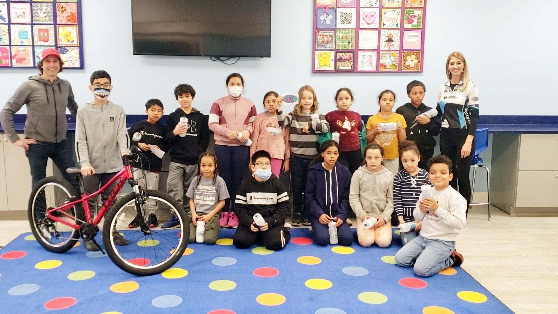 Students of the Martin Luther King Jr, Community Center are pictured here at Apex Technology Group's Client Appreciation: Cycle Safety Event. 