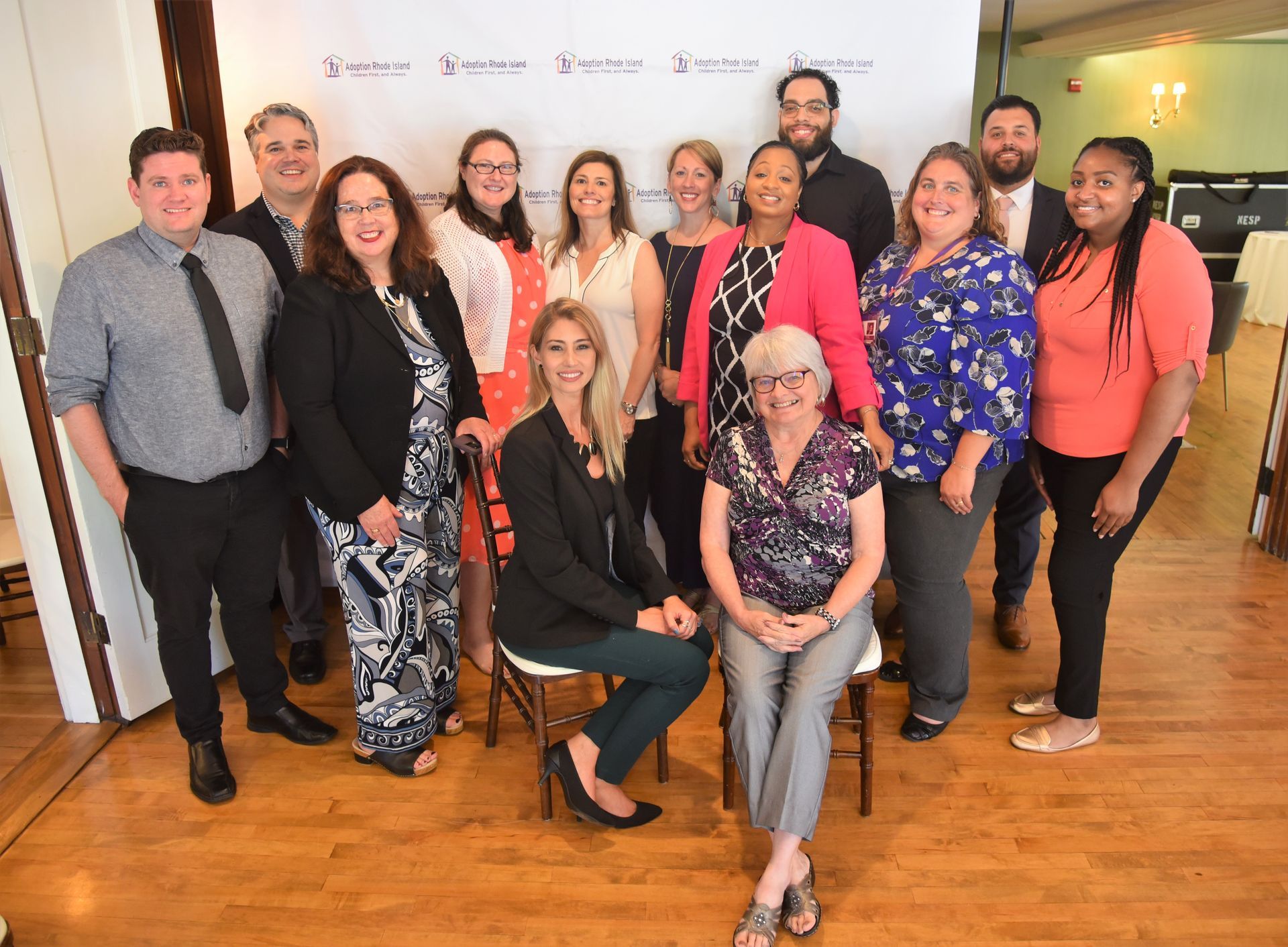 Apex Technology Group's Michael O'Connell, Heather Mosca, Ceasar Abreu, and Kimberly Donald are pictured with the leadership team of Adoption Rhode Island at their annual Gathering to Give event. 