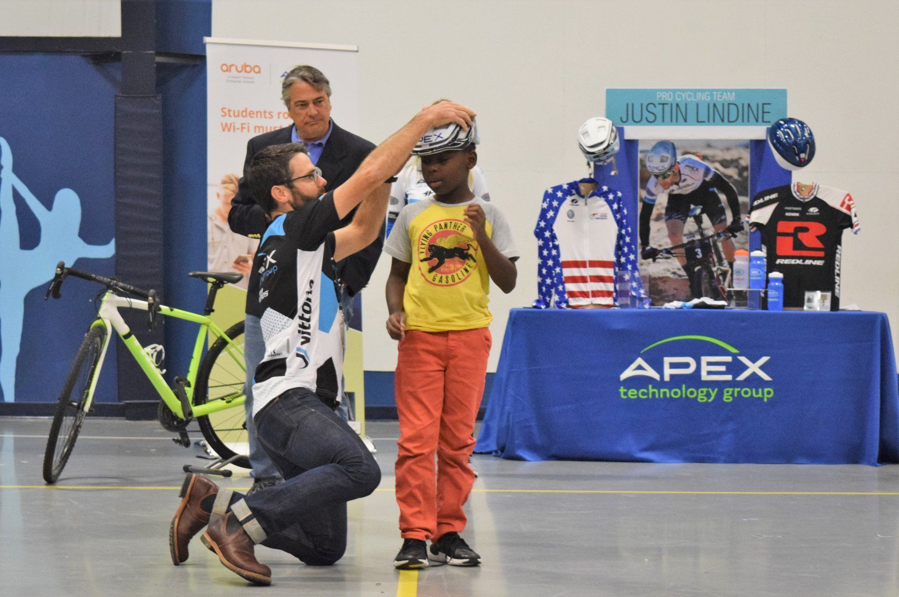 Professional Cyclist, Justin Lindine, is  pictured here at Apex Technology Group's Client Appreciation: Cycle Safety Event. 