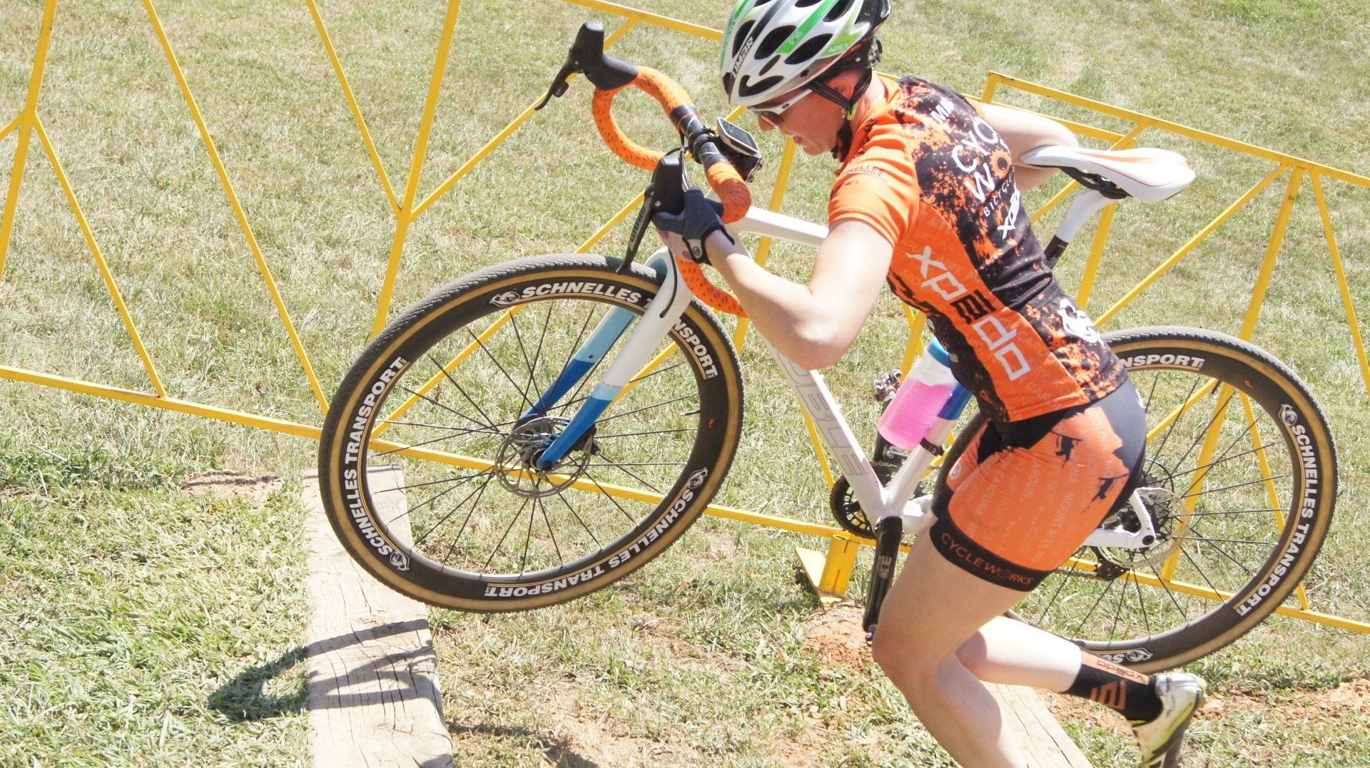 Woman Lifting a Bike  — Boston, MA — Apex Technology Group