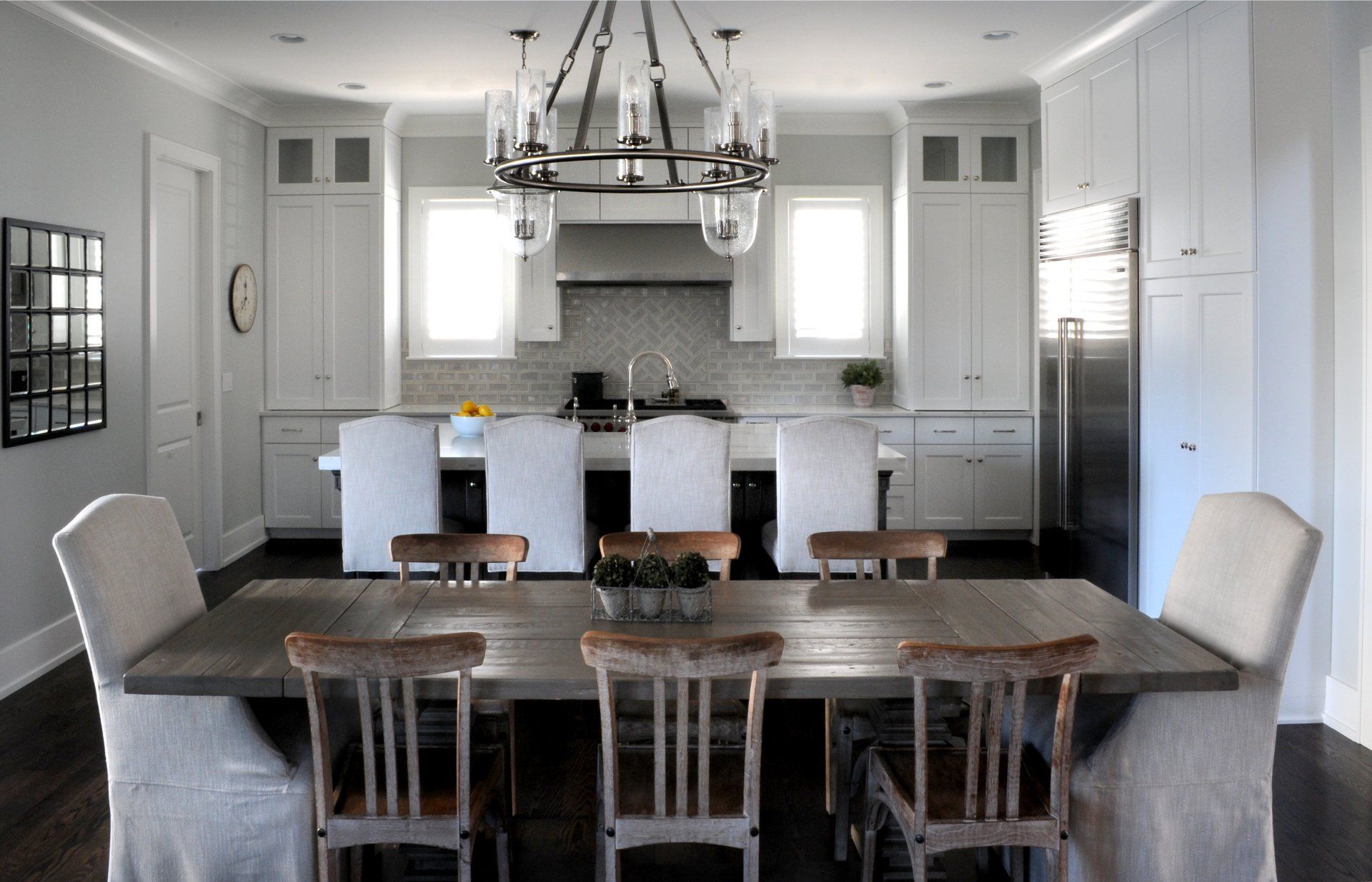 A kitchen with a table and chairs in it