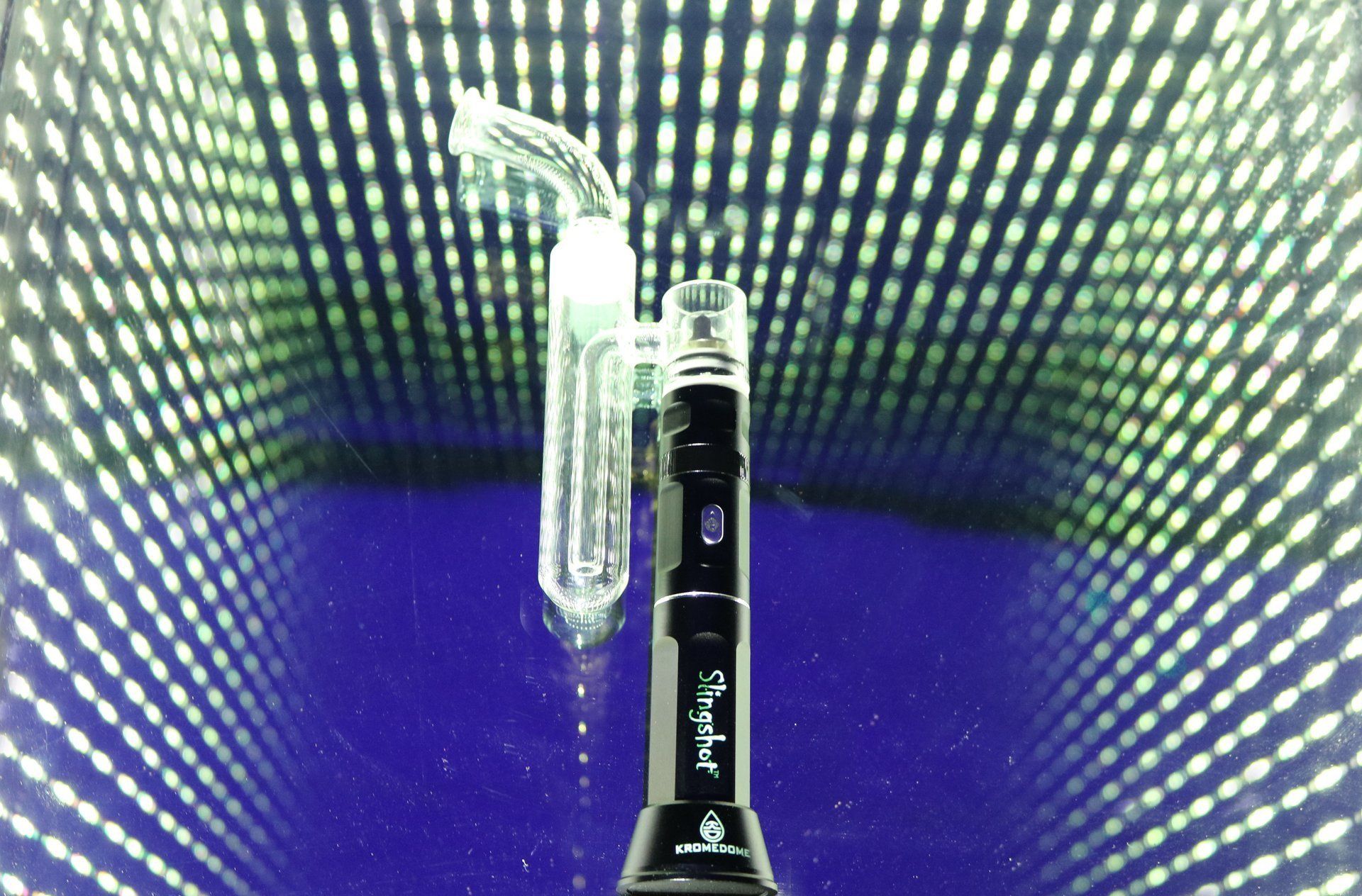 a microphone is sitting on a table in front of a wall of lights .