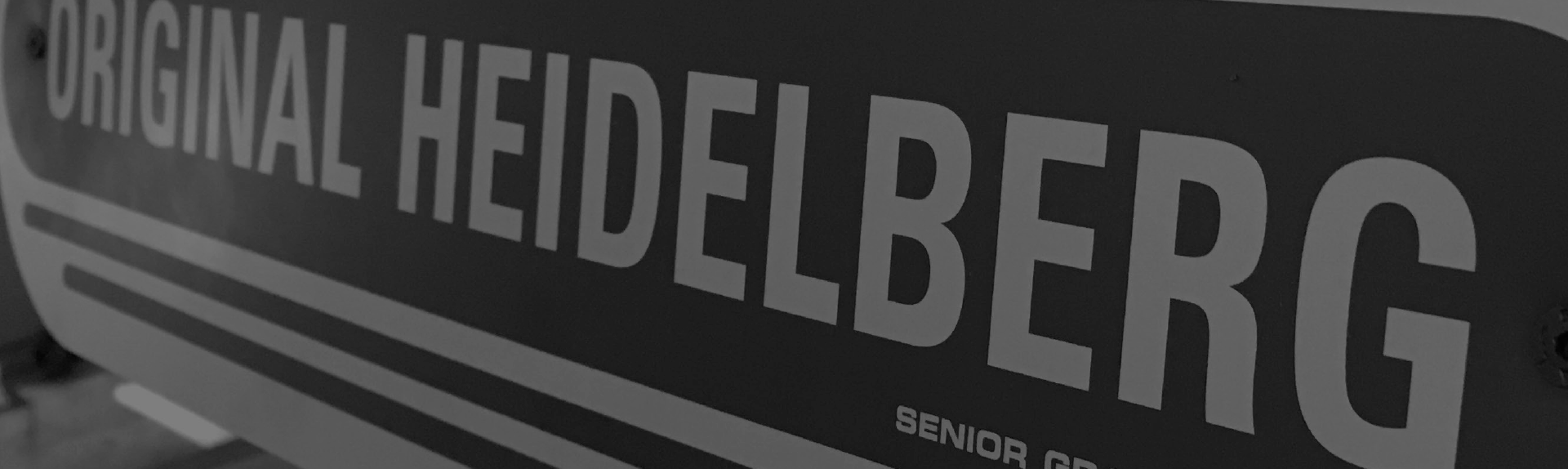 A black and white sign that says original heidelberg
