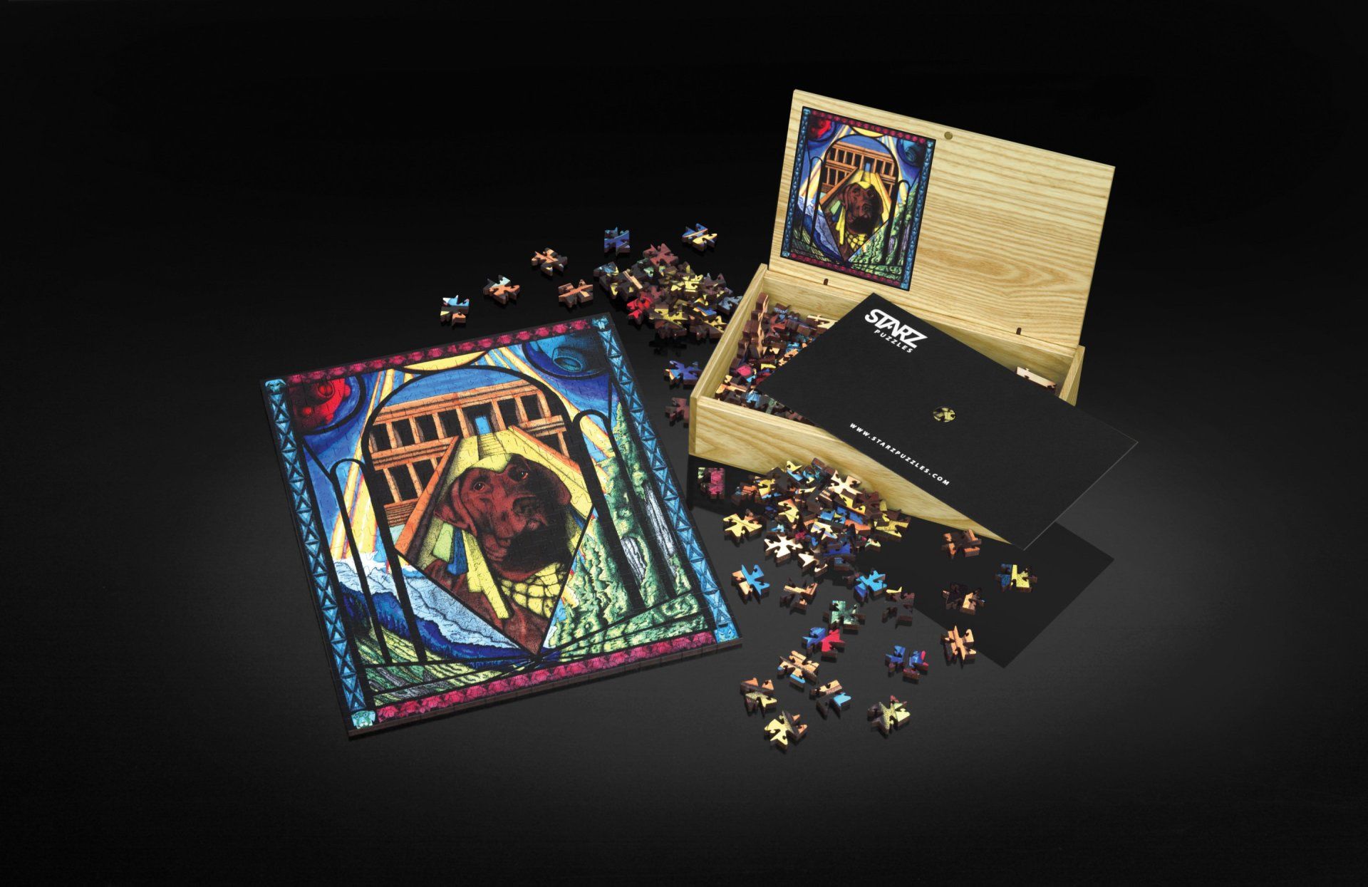 A puzzle in a wooden box with a picture of a bridge on it