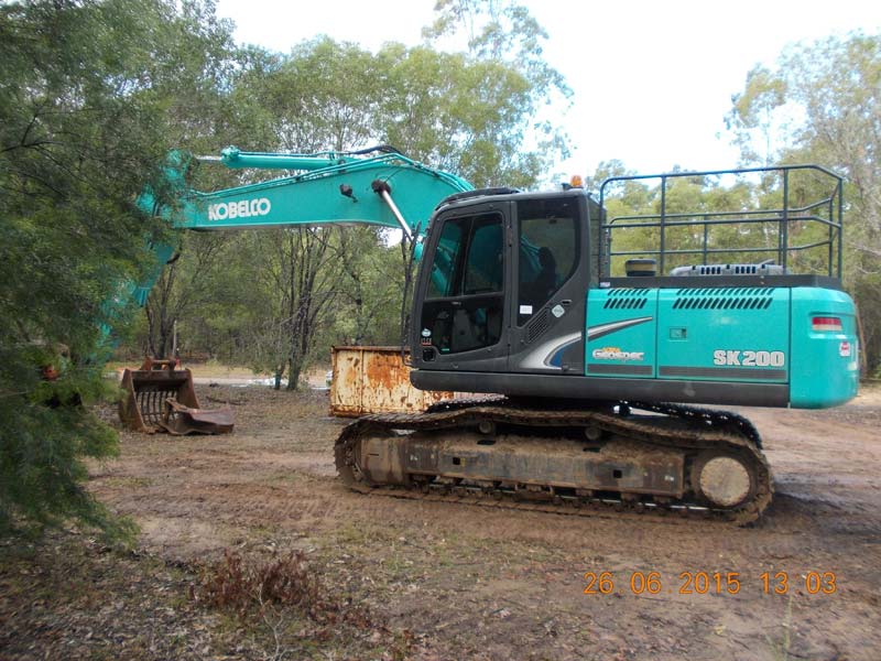 teal excavator