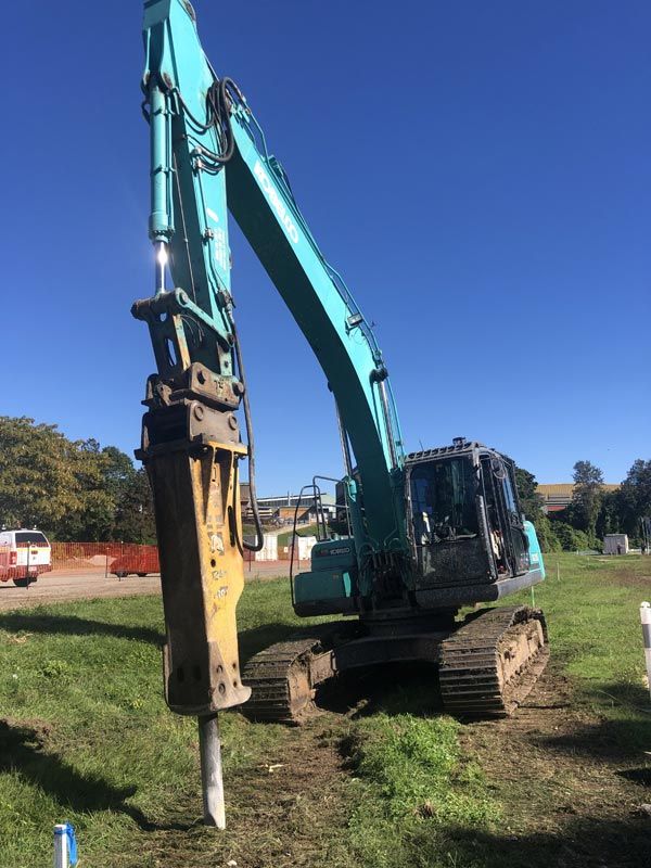 excavator with rock breaker