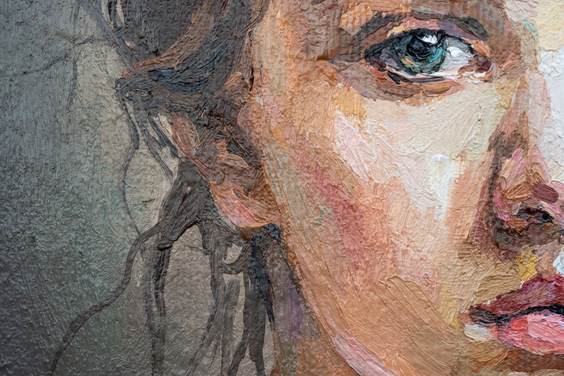 A close up of a woman 's face in a painting.