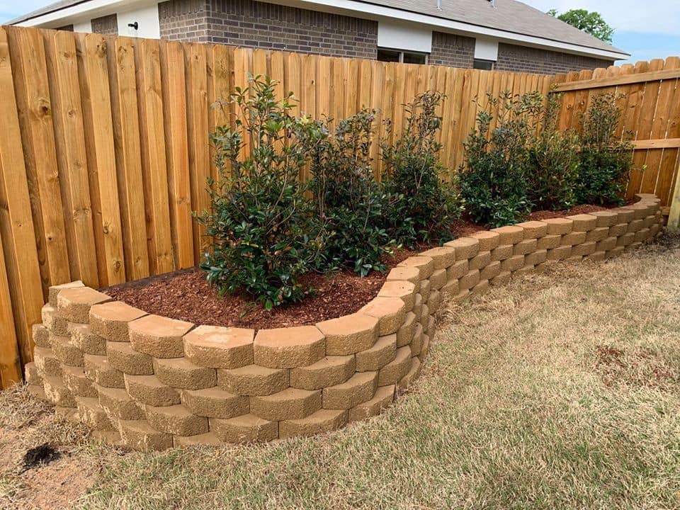 Retaining Wall Beside Fence — Tyler, TX — Creative Landscape Solutions