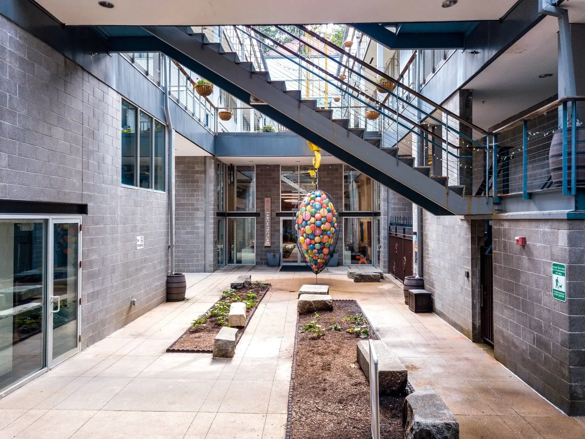 a large building with stairs leading up to the top of it .