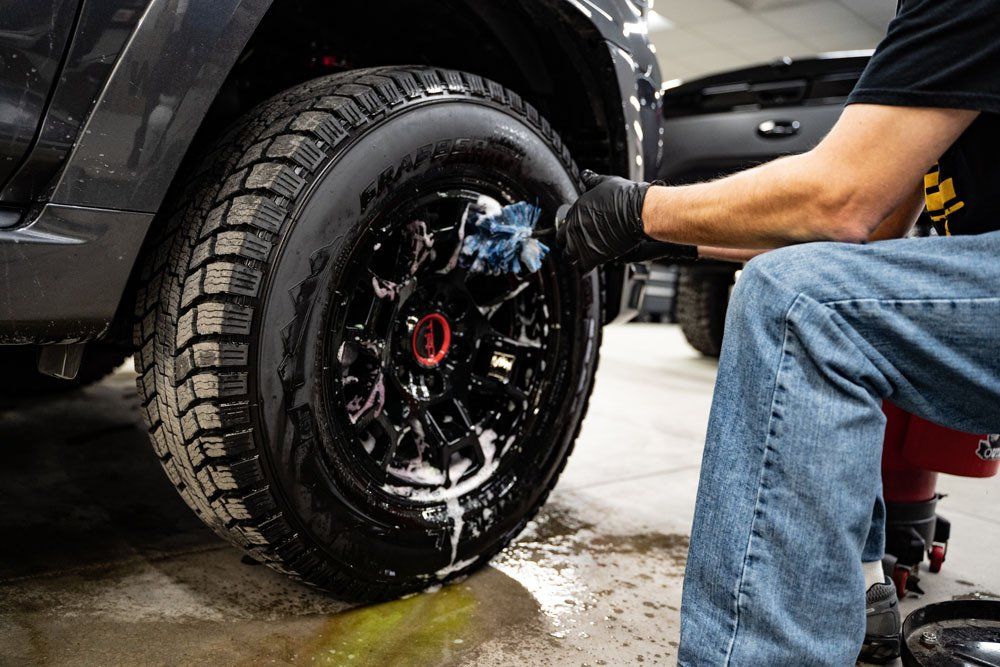 Tire shine being applied to corvette tires