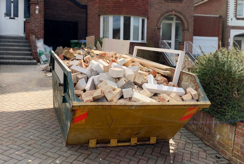 Yellow Dumpster Filled With Construction Debris  — Red E Bins In Laurieton, NSW