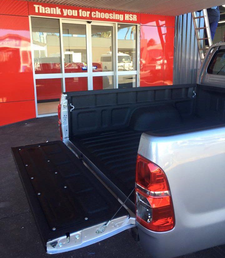 Back Of Ute In Front Of Store — Holmes Smash Repairs in Toowoomba, QLD