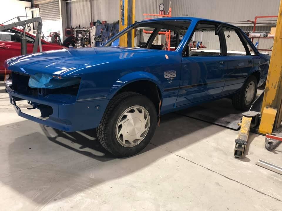 Blue Car Being Repaired — Holmes Smash Repairs in Toowoomba, QLD