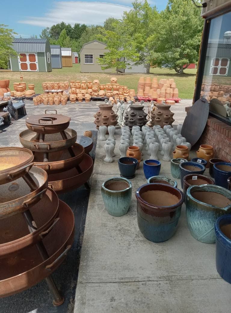 A bunch of pots are stacked on top of each other