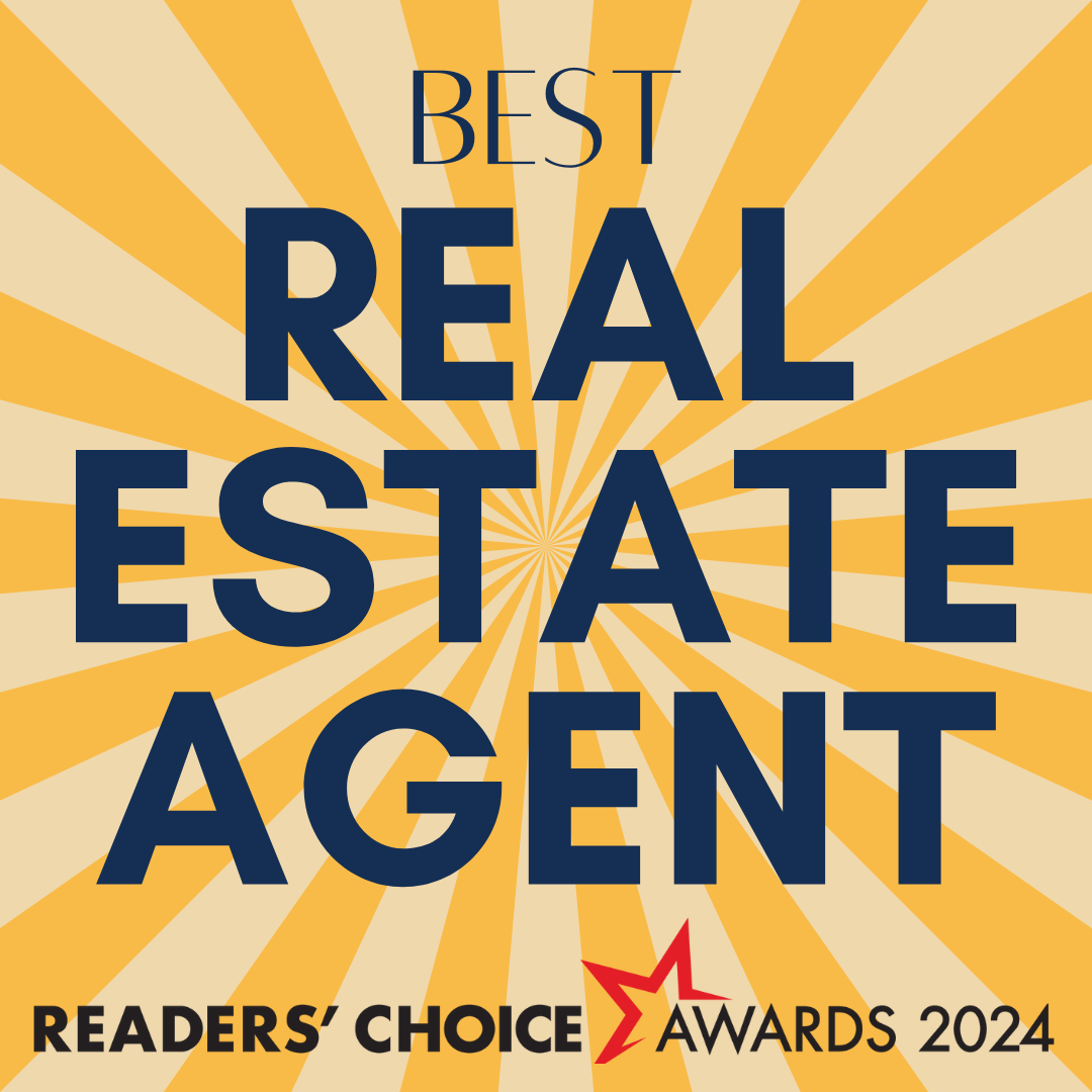 A sign that says best real estate agent on it
