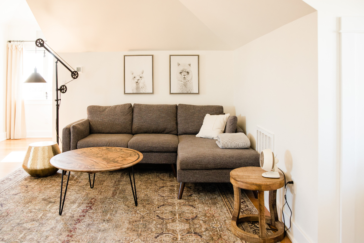 There is a couch and a coffee table in the living room.