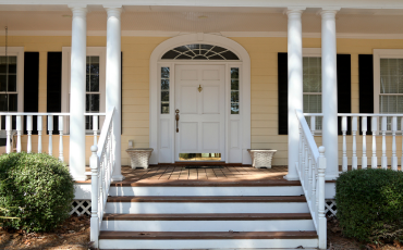 A photo of a good-looking porch in Lubbock. The porch was built in the front of the house and makes for a warm, welcoming entrance for the home.