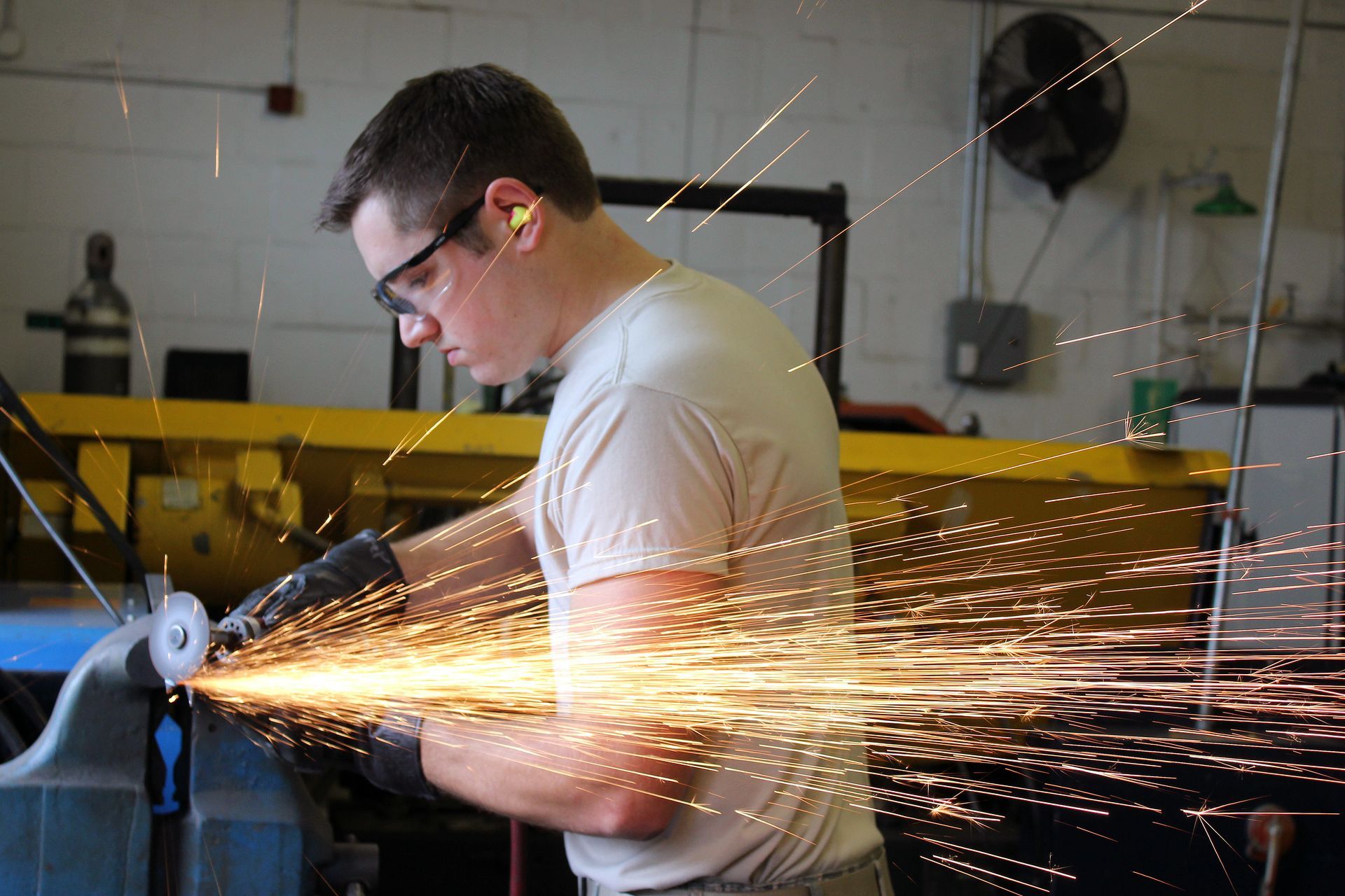 Man using a grindstone
