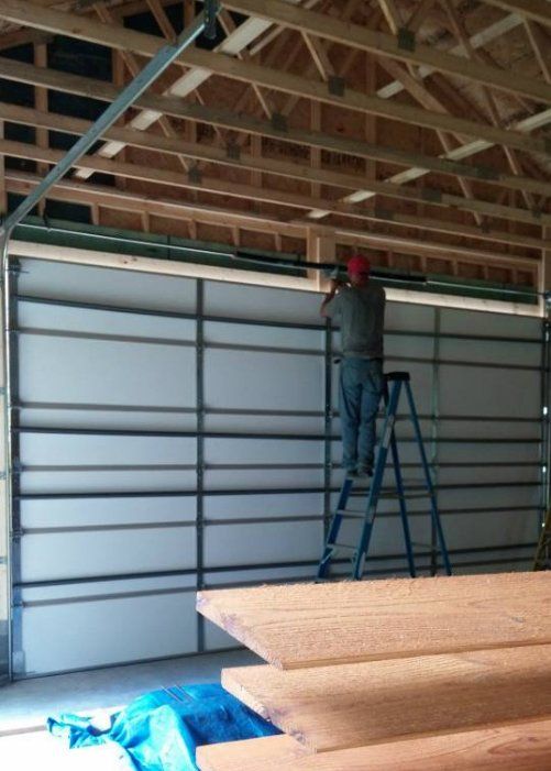 Wooden Garage Door — Milford, OH — Mike’s Garage Door Repair