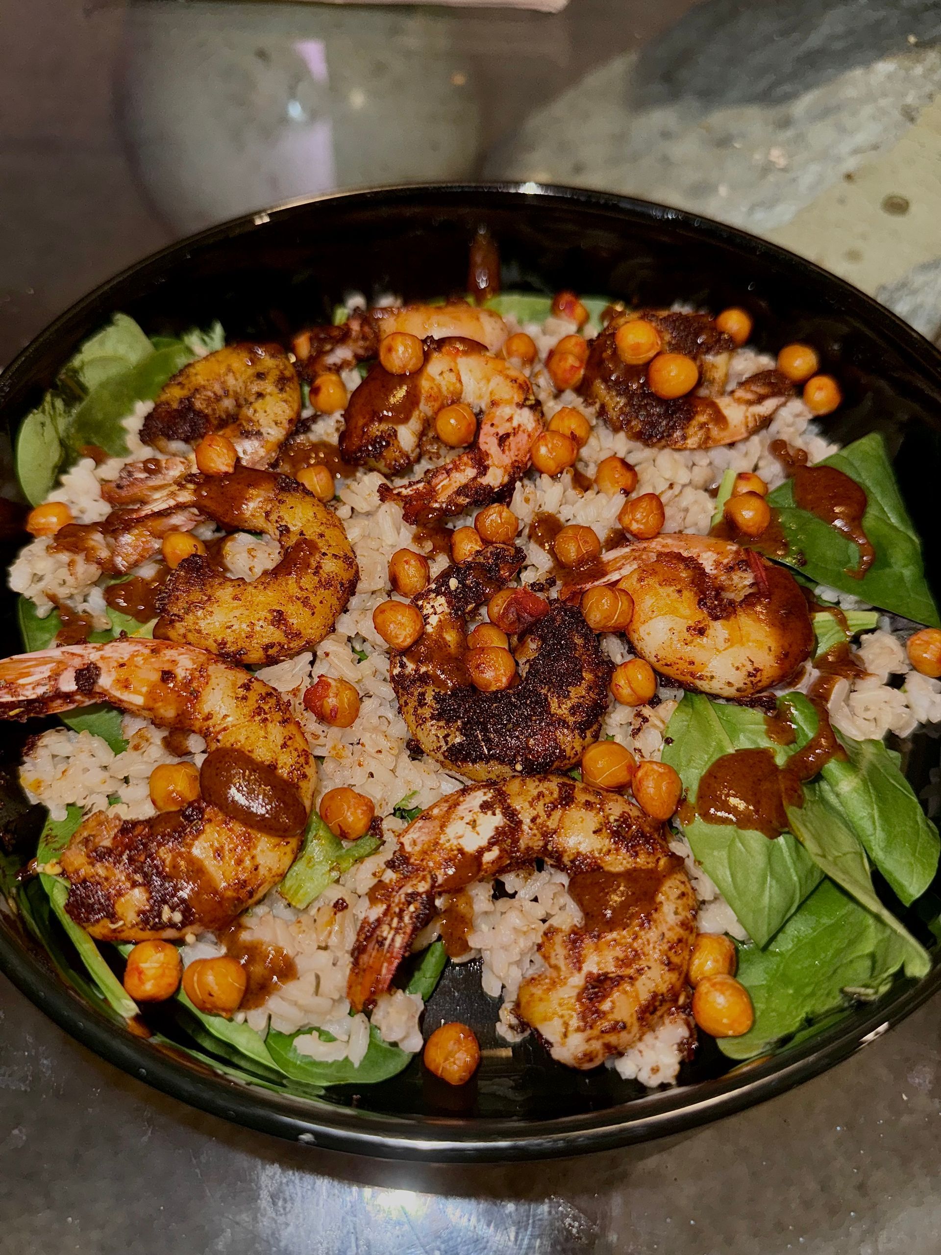 Themed private chef from A Woman’s Touch plating high-end entrée in NC