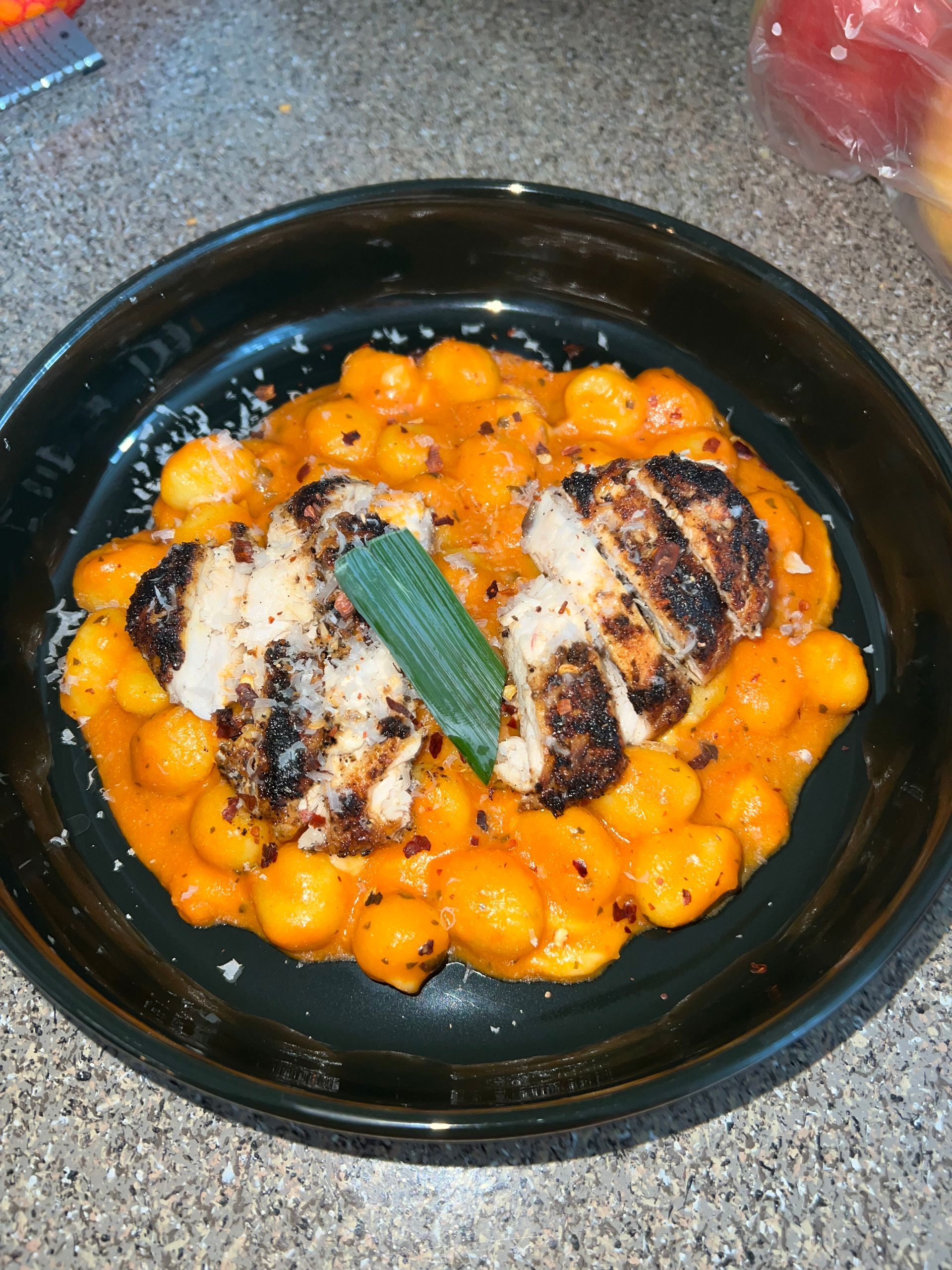 Personal chef from A Woman’s Touch setting romantic dinner table in Charlotte