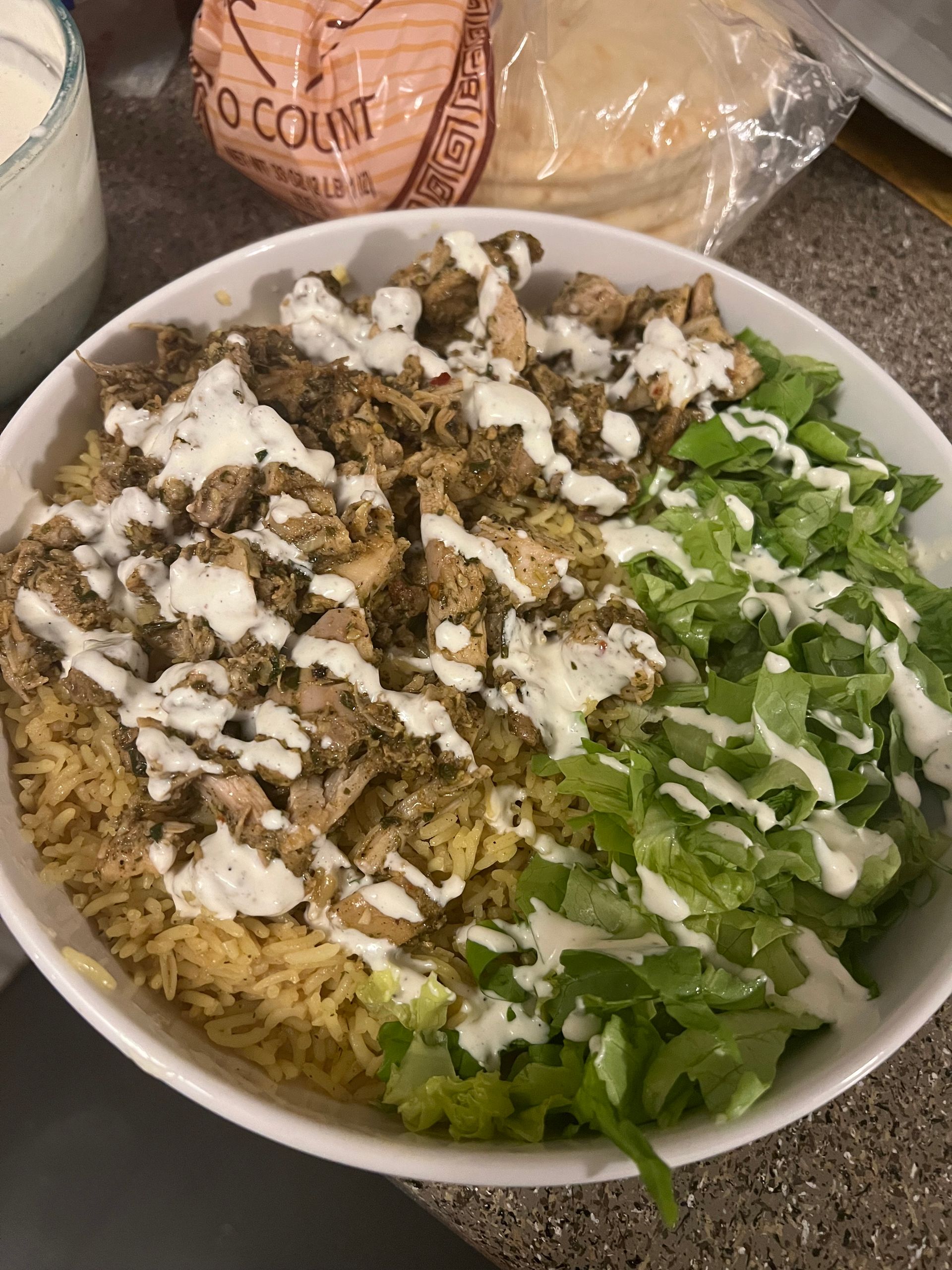 Chef from A Woman’s Touch arranging table setting for private dining event