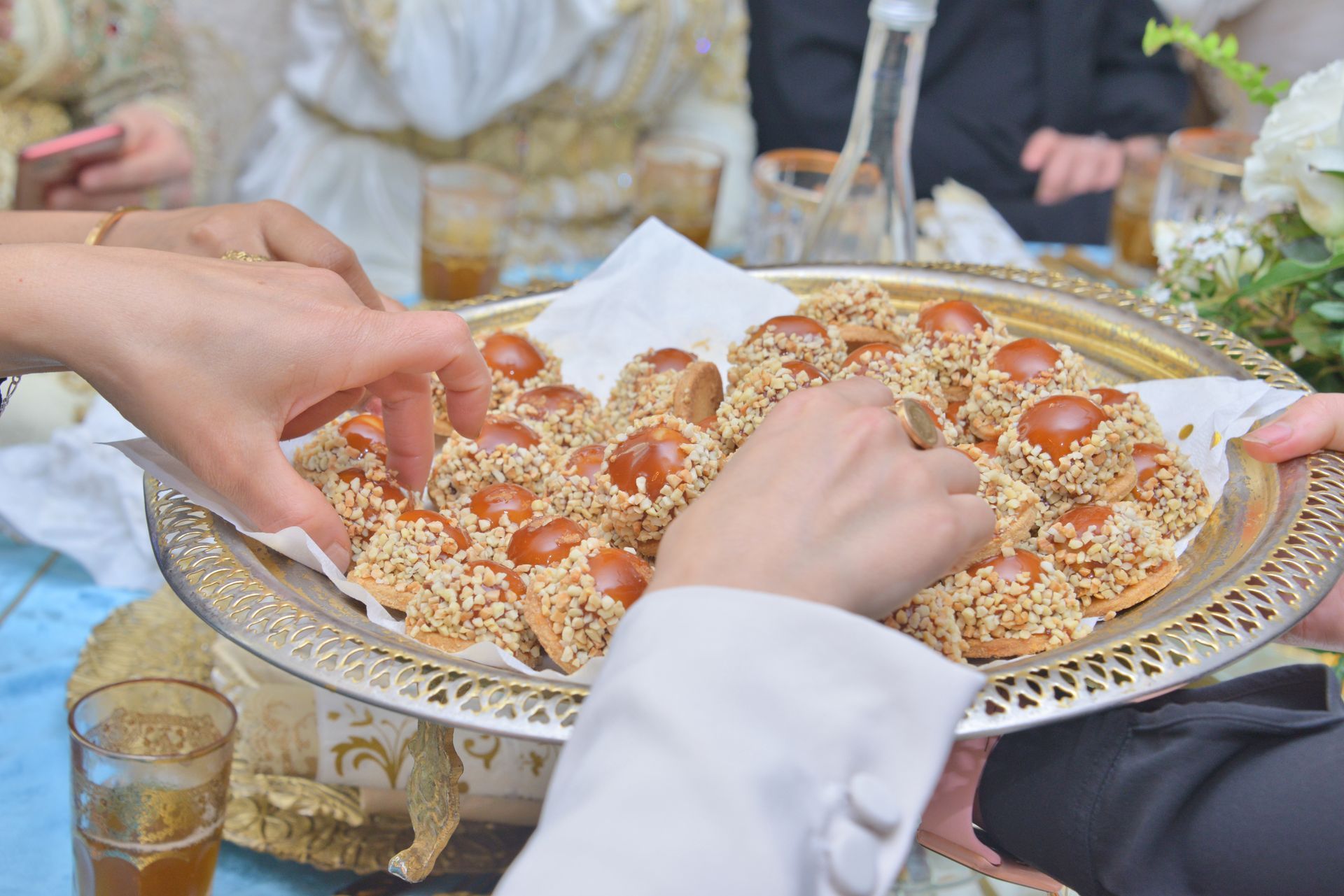 A person is holding a plate of food in their hands.