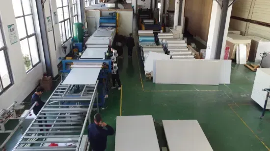 An aerial view of a factory filled with lots of tables and machinery.