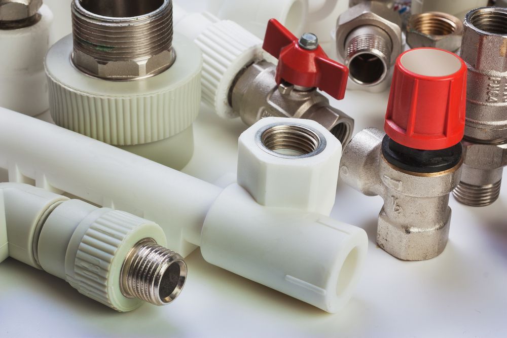 Close-up Of Various Plumbing Fittings — DSR Plumbing Pty Ltd in Cessnock, NSW