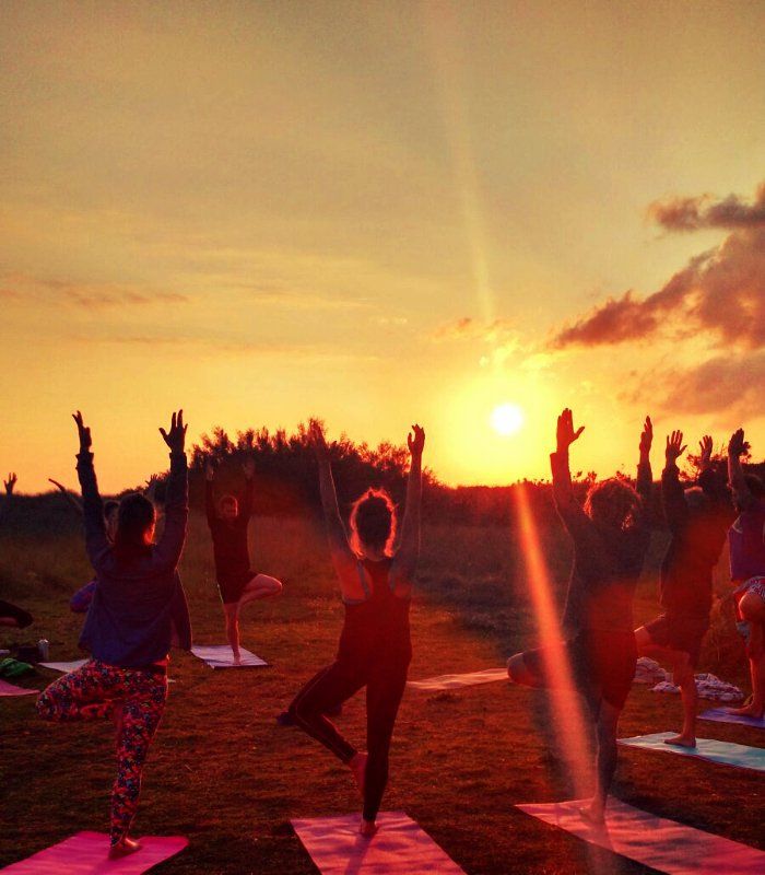 Kula yoga outdoor yoga sunset earthing