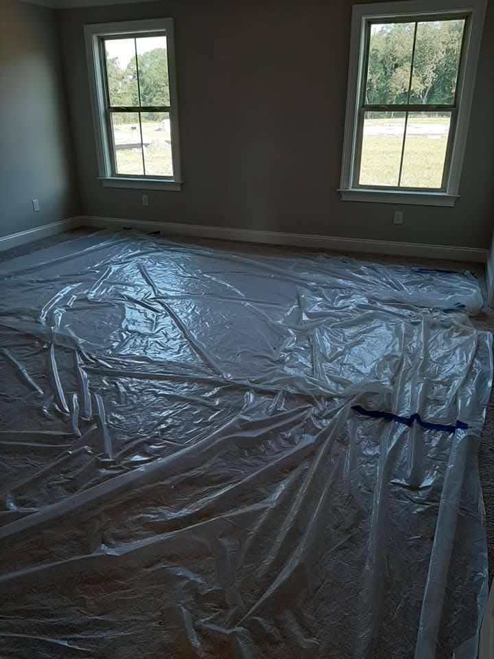 A room with a lot of plastic on the floor.
