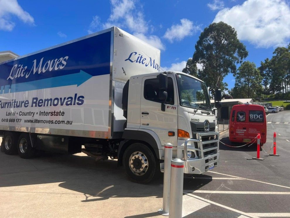 White Lite Moves Furniture Removal Truck Parked